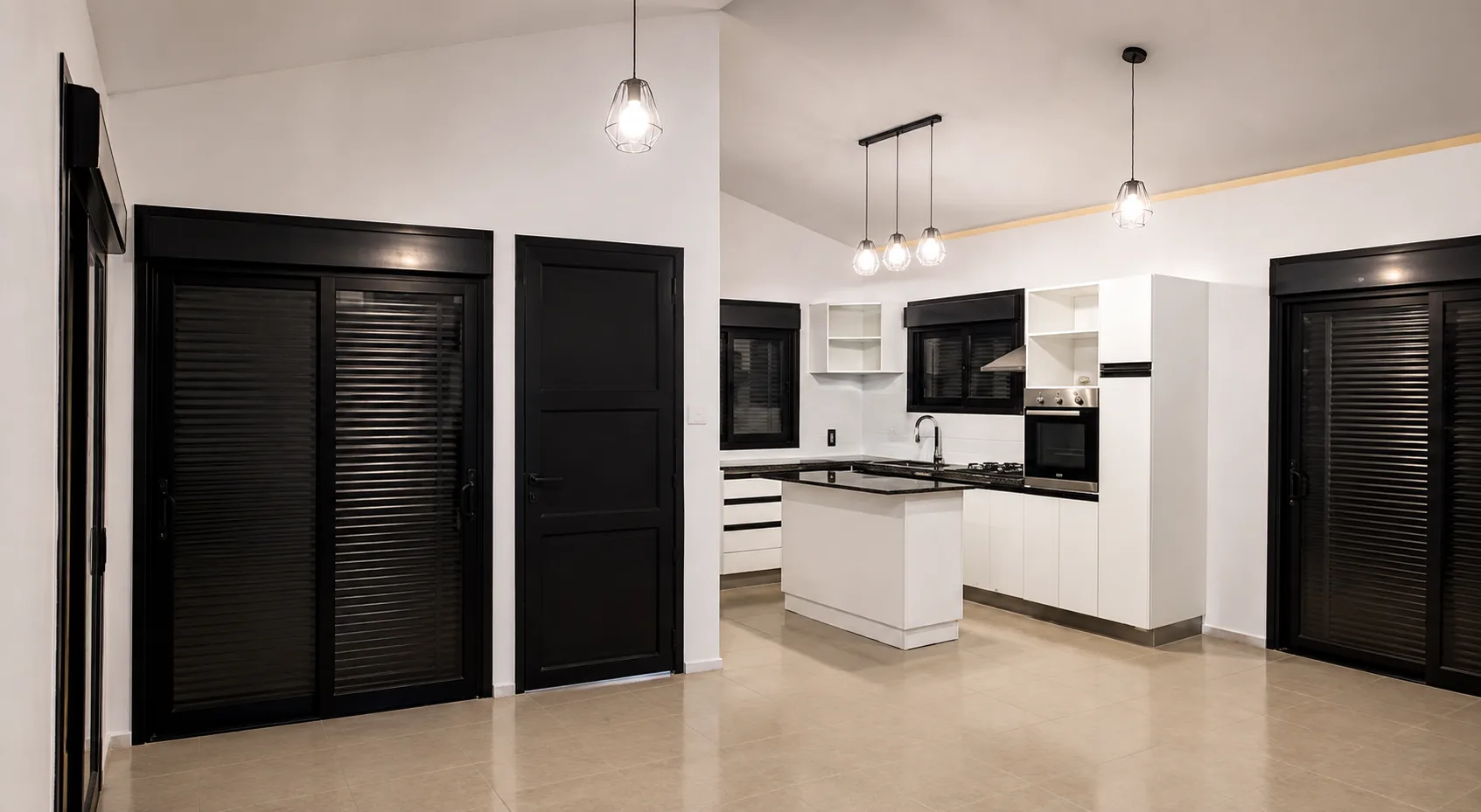 Living integrado con cocina, casa de isopanel.